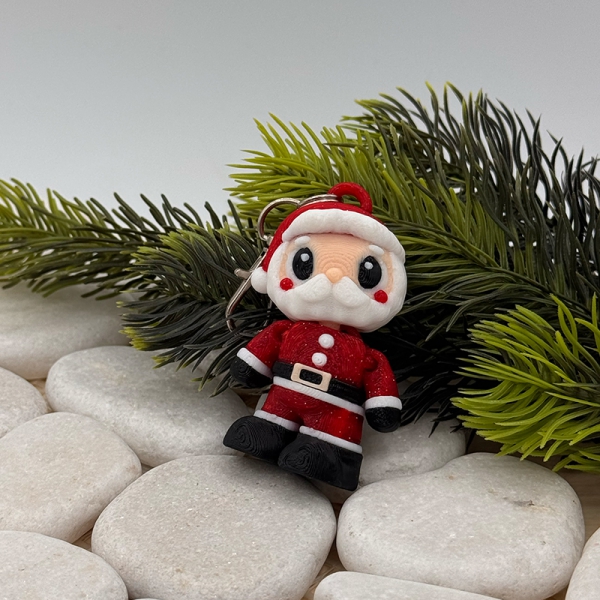 Mini Weihnachtsmann Anhänger – Der bewegliche Helfer vom Nordpol für unterwegs