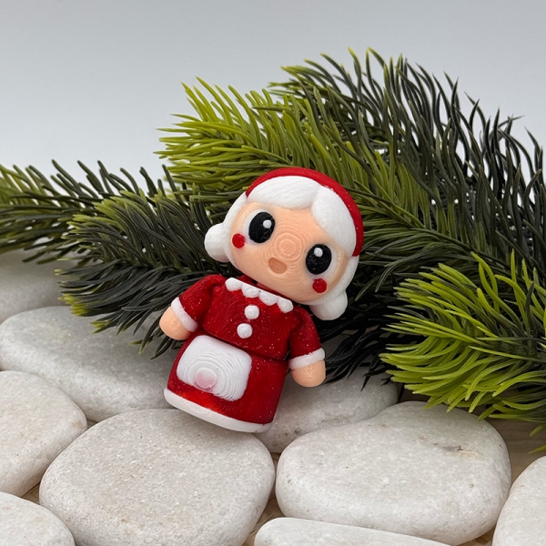 Mini Weihnachtsfrau – Liebevolle Begleiterin für die festliche Zeit